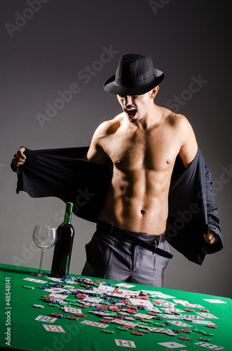 Photo: Naked broke businessman in casino Naked broke businessman in casino