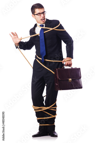 Photo: Businessman tied up with rope on white Businessman tied up with rope on white