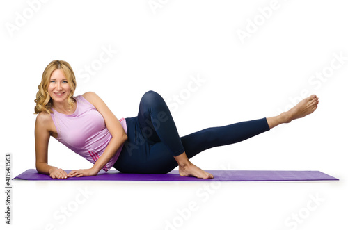 Photo: Sport concept - Woman doing sports on white Sport concept - Woman doing sports on white