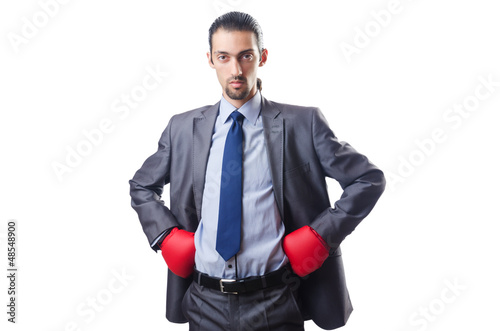 Photo: Businessman with boxing gloves on white Businessman with boxing gloves on white