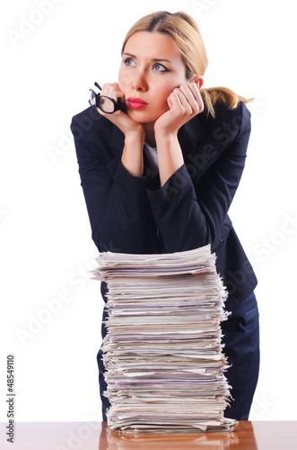 Photo: Woman businesswoman with lots of papers Woman businesswoman with lots of papers