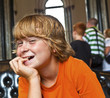 Photo: boy takes a rest at a sofa boy takes a rest at a sofa
