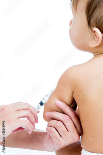 Photo: doctor vaccinating baby isolated on a white background doctor vaccinating baby isolated on a white background