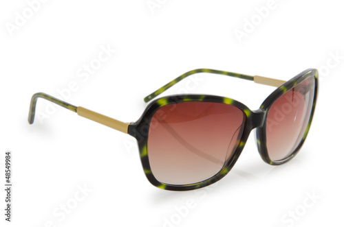 Photo: Fashion concept with sunglasses on white Fashion concept with sunglasses on white