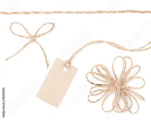 Photo: Rope bow tag. Jute wrapping collection for present and pricing. Rope bow tag. Jute wrapping collection for present and pricing.