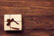 Vintage gift over wooden background