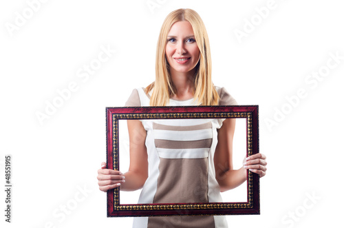 Photo: Woman with picture frame on white Woman with picture frame on white