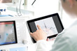 Doctor at work with a digital tablet