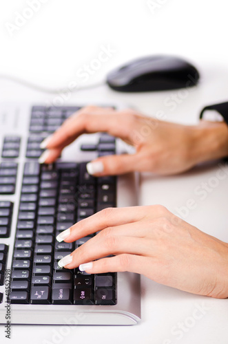 Photo: Hands working on the keyboard Hands working on the keyboard