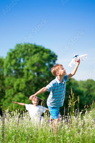 Photo: Happy children on meadow Happy children on meadow