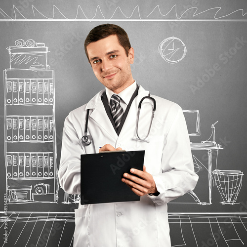Photo: Doctor Man With Clipboard Doctor Man With Clipboard