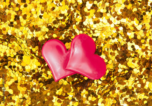 Photo: valentine's day hearts on golden background valentine's day hearts on golden background