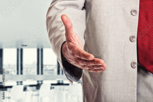 Photo: A business man with an open hand A business man with an open hand