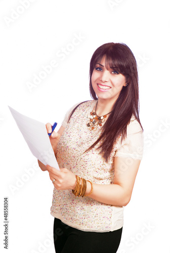Photo: Smiling supervisor writing inspection notes Smiling supervisor writing inspection notes