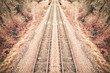 HDR abstract of autumnal railroad tracks