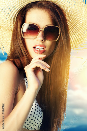 Photo: Portrait of a beautiful woman in bikini Portrait of a beautiful woman in bikini