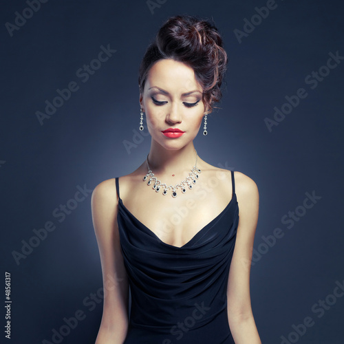 Photo: Elegant lady in evening dress Elegant lady in evening dress