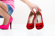 Ladys leg , shoes , and shopping bag