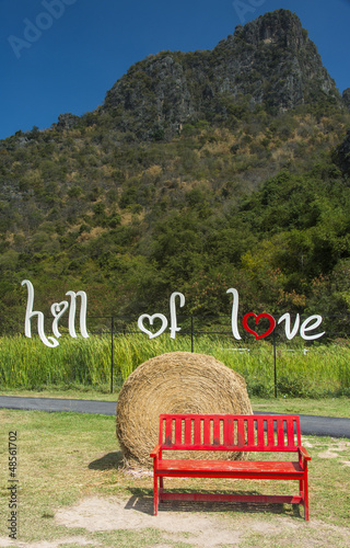 Photo: red bench in the hill of love red bench in the hill of love