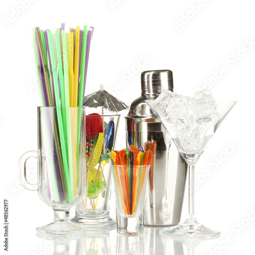 Photo: Cocktail shaker and other bartender equipment isolated on Cocktail shaker and other bartender equipment isolated on
