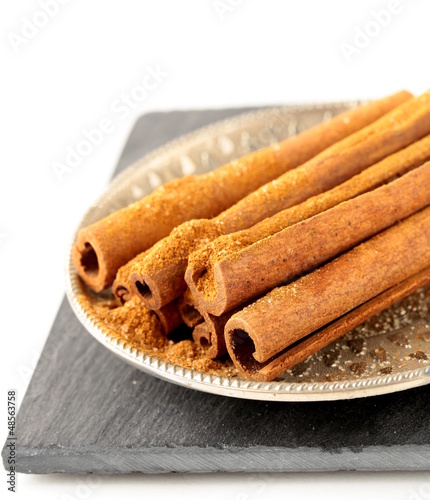Photo: Cinnamon sticks and powder cinnamon Cinnamon sticks and powder cinnamon