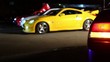 Man opens door and comes out from one of several cars