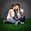 lovely couple kissing on grass