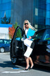 business woman exit her car