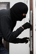 burglar thief at house breaking