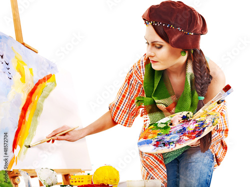 Photo: Female artist at work. Female artist at work.