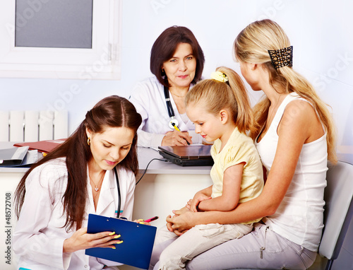 Photo: Family on reception at doctor. Family on reception at doctor.