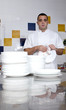 Photo: man drying dishes man drying dishes