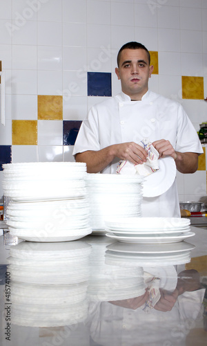Photo: man drying dishes man drying dishes