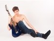 Photo: young fit male with electric guitar young fit male with electric guitar