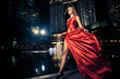 Fashion Lady In Red Dress And City Lights
