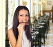 Photo: Young Girl Eating Chocolate Young Girl Eating Chocolate