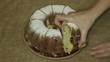 Hands take home made cake