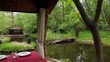 Table is set in summerhouses ashore of small pond