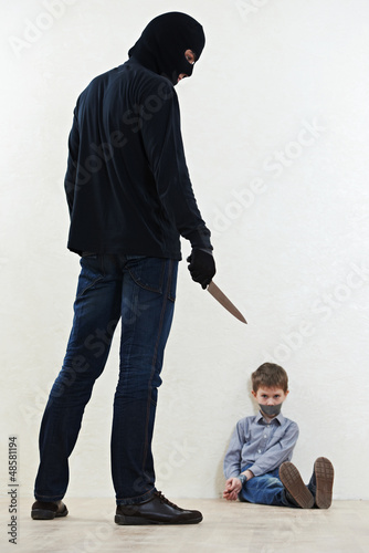 Photo: thief kidnapper with child thief kidnapper with child