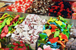Many colorful candies on market stand