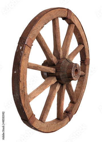 Photo: Old wooden wheel on the white background Old wooden wheel on the white background