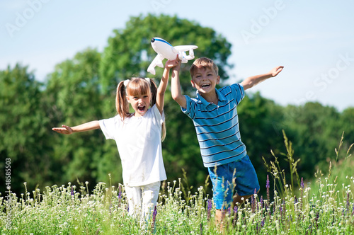 Photo: Happy children on meadow Happy children on meadow