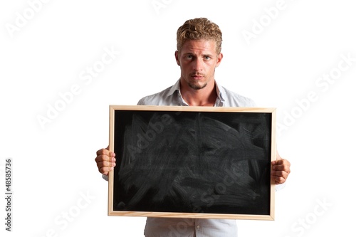 Photo: Young boy with blackboard Young boy with blackboard