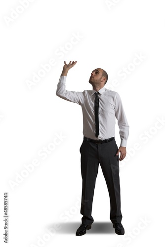 Photo: Business man holding something heavy Business man holding something heavy
