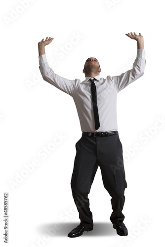 Photo: Business man holding something heavy Business man holding something heavy