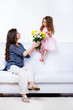 Mother with  flowers  and  daughter