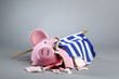 Robbed piggy bank with Greek flag