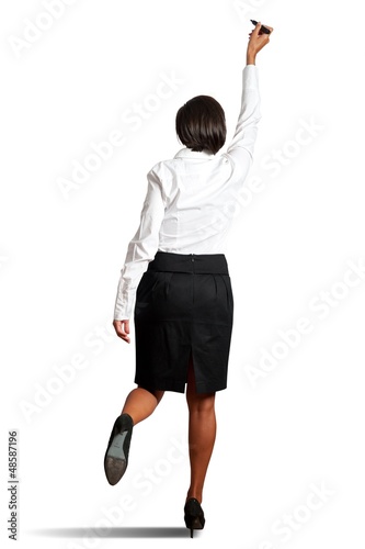 Photo: Businesswoman drawing on wihteboard Businesswoman drawing on wihteboard