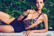 Glamorous lady in lace leotard
