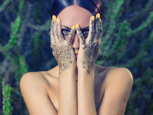 Photo: Lady with painted hands mehendi Lady with painted hands mehendi
